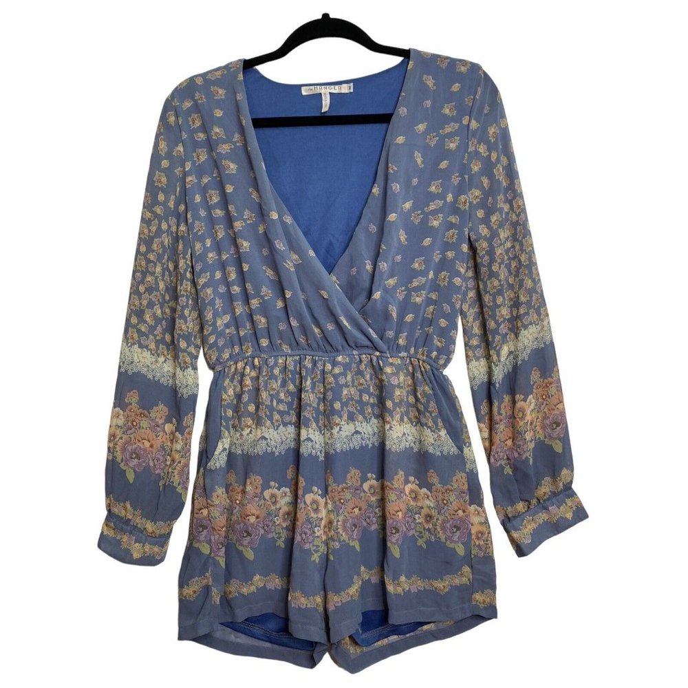 The Hanger Floral Romper Size Medium Baby Blue Long Sleeve Pockets Floral Shorts